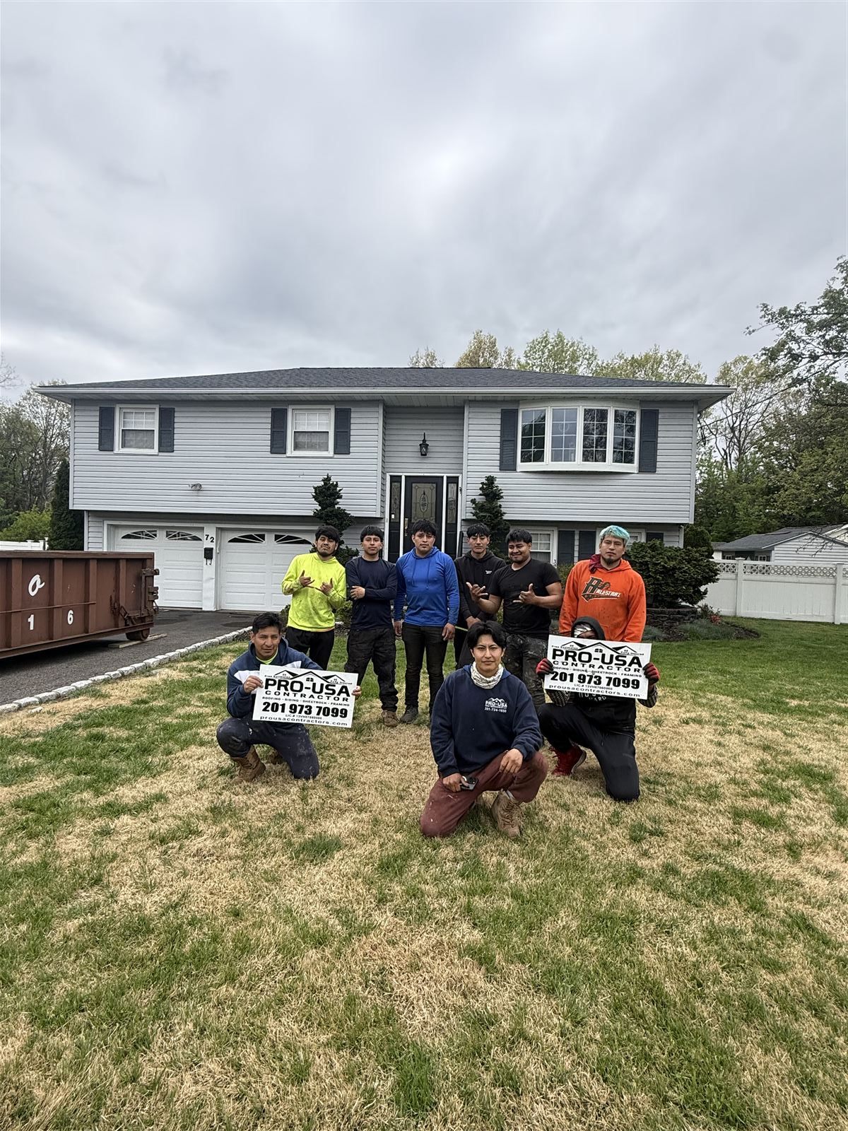 Pro USA Contractors crew after completing a siding job in New Jersey