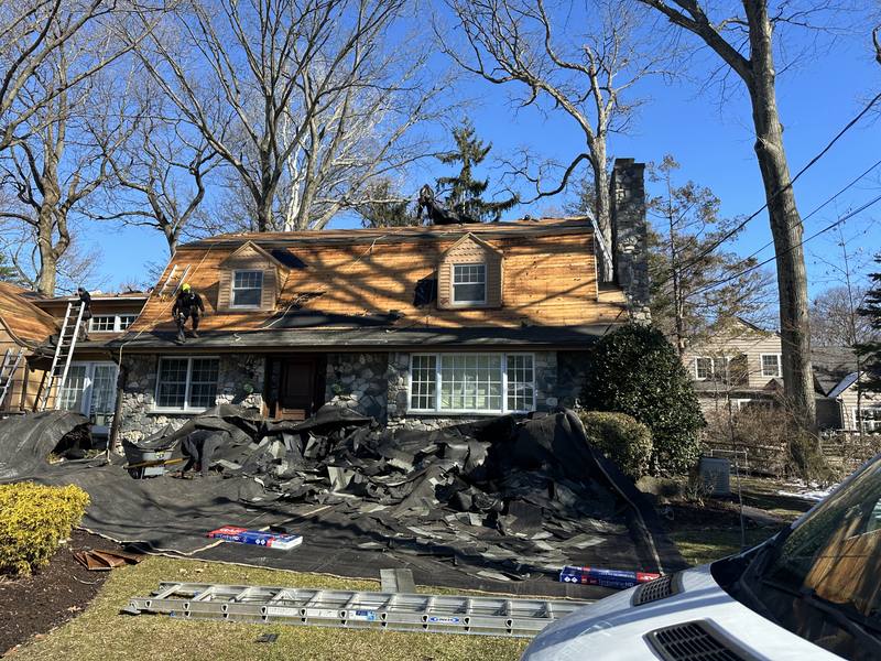 Complete tear-off and replacement in progress