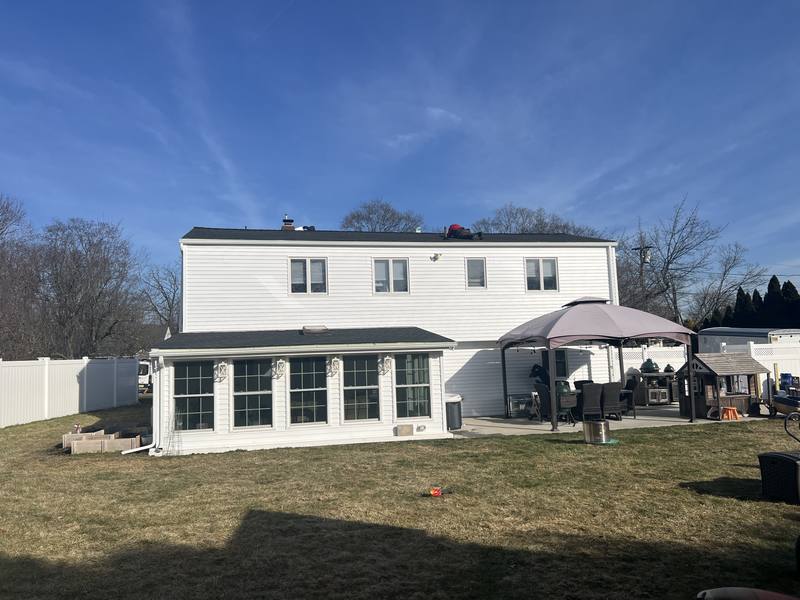 New roof installation — white colonial, Essex County