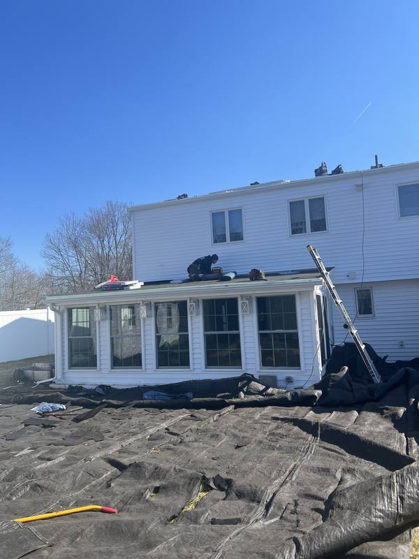 Roof replacement in progress — sunroom addition, NJ