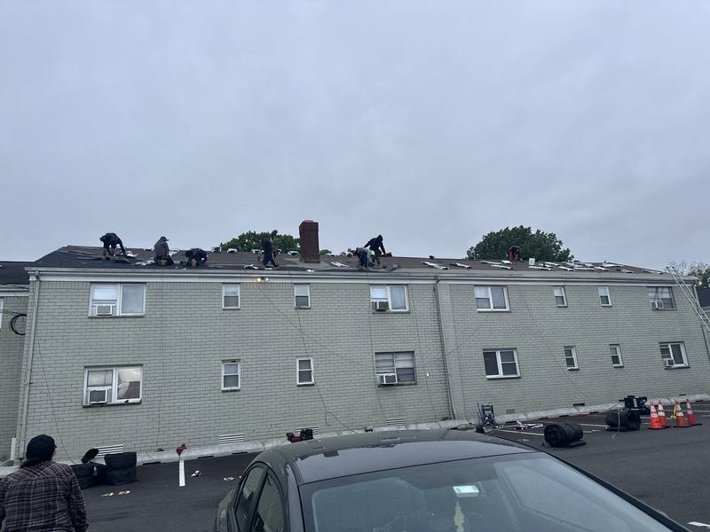 Full commercial building re-roof — entire crew deployed