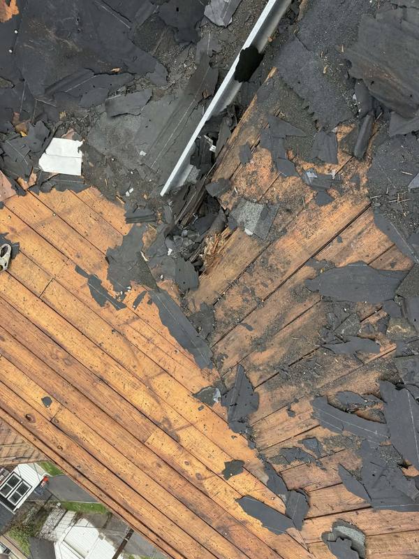Deteriorated shingles — before full replacement